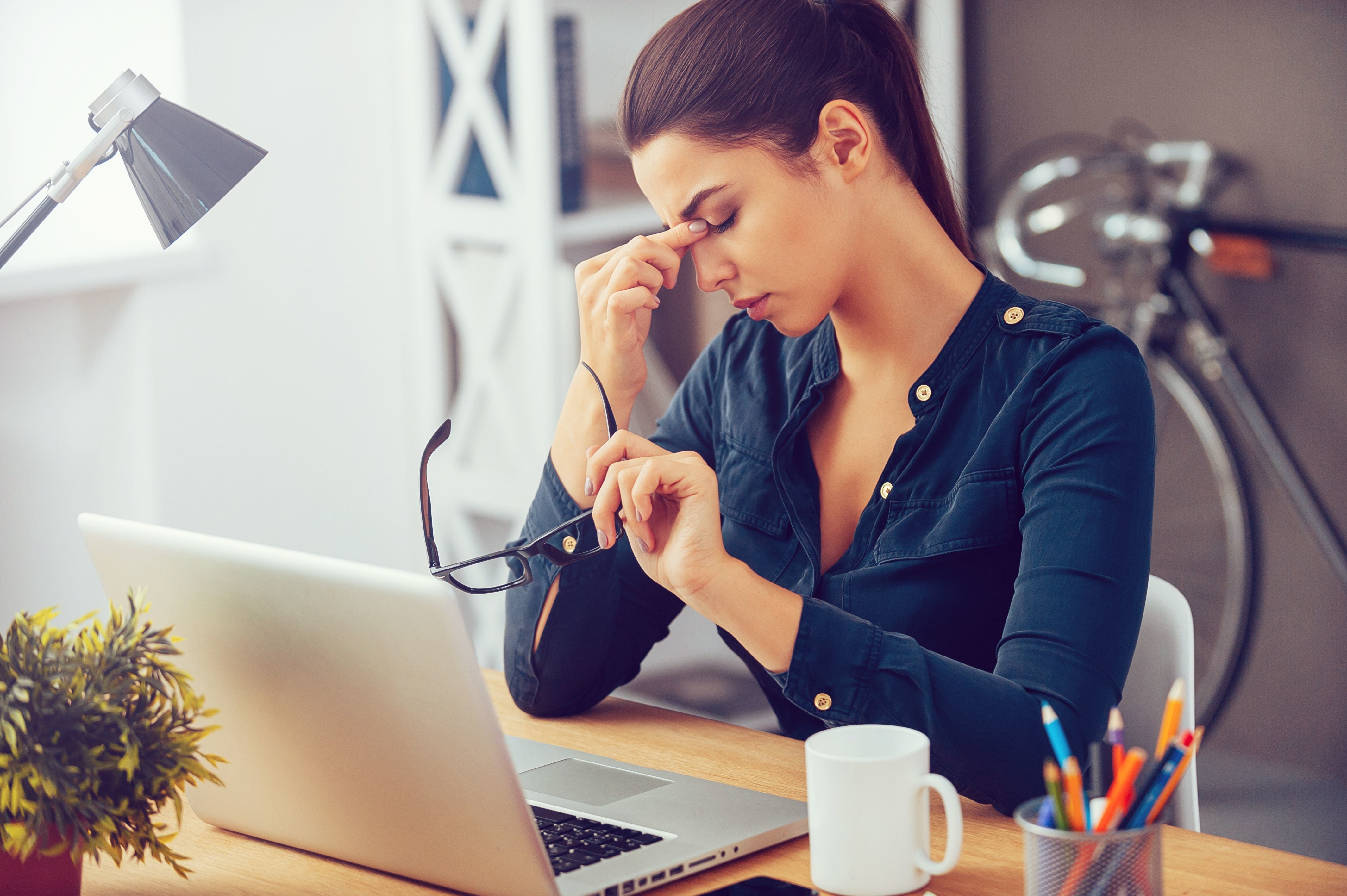 stressed woman at home office
