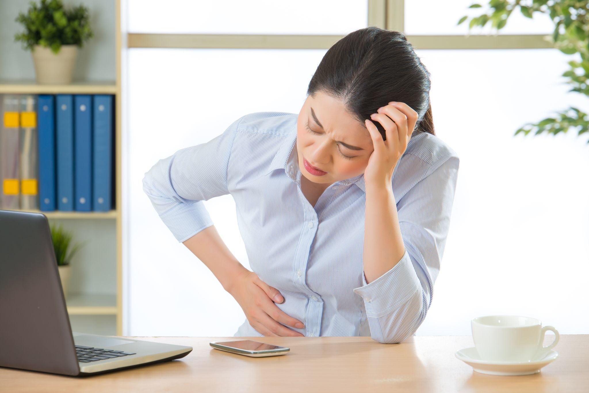 woman in agony from stomach ache