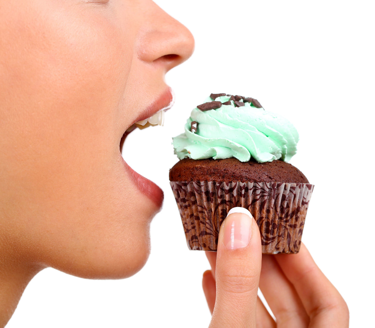 woman eating muffin