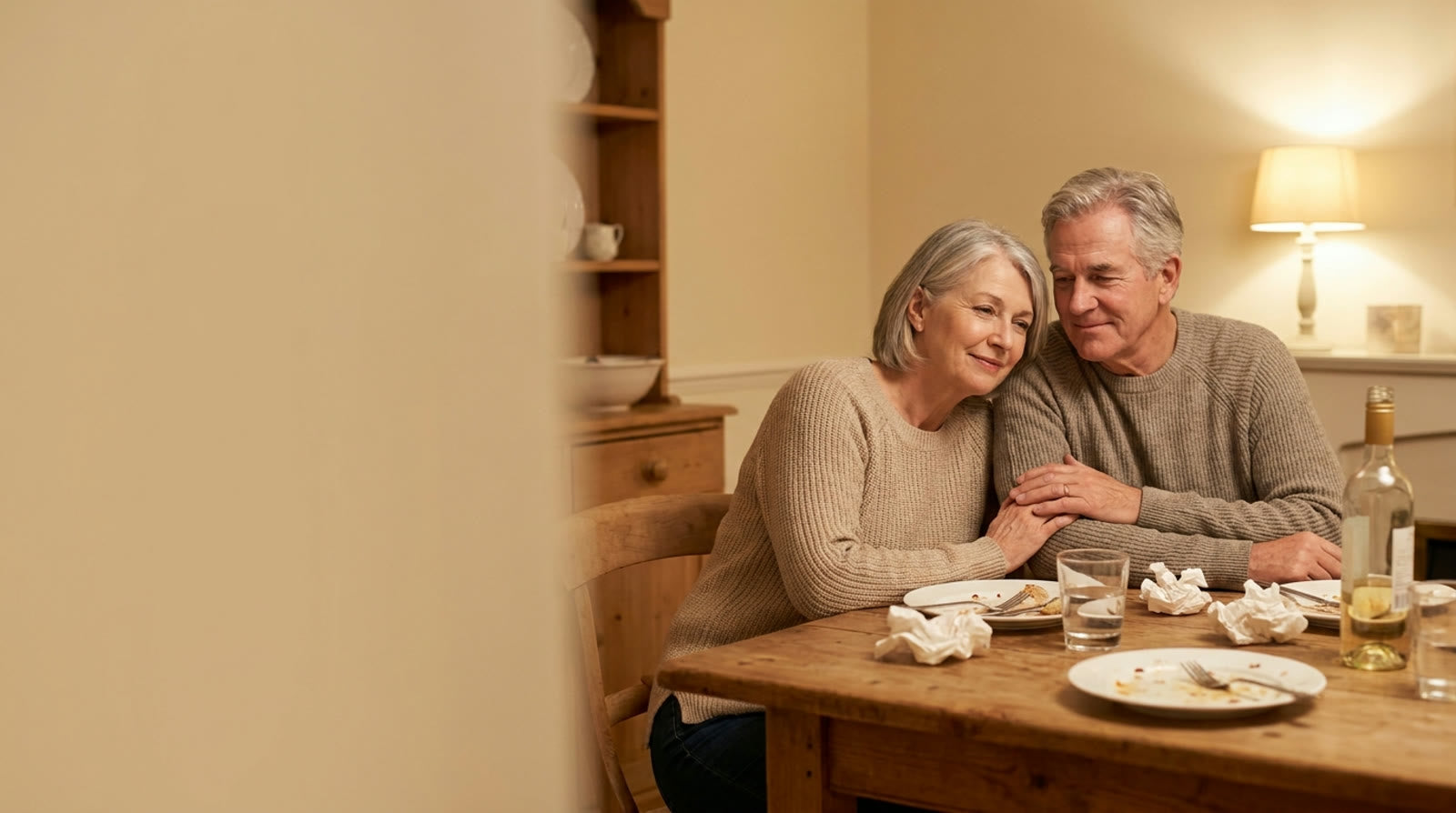 A happy couple relaxing together after a big home-cooked family dinner